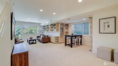 The lower level provides exceptional versatility with a third bedroom, full bath, and a dramatic bonus room.