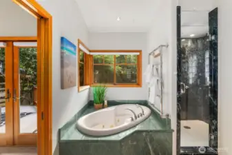 Soak in your tub overlooking your garden space in privacy and great light!