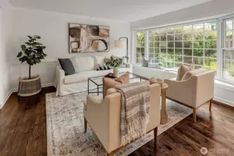 Living room with a large bay window.