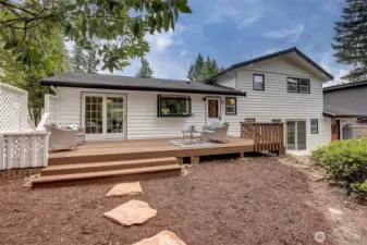 The backyard oasis-complete with mature landscaping, fruit trees.