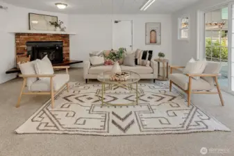 The basement provides a versatile great room with new carpet.