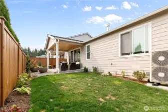 Private Backyard with Covered Patio – Fully fenced yard with easy-care landscaping and a covered patio, ideal for outdoor dining, gardening, or relaxing year-round.