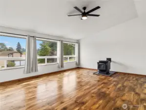 Oversized living room with big windows that show off Mt. Rainier
