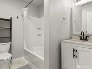 Full bathroom downstairs off garage/additional living space