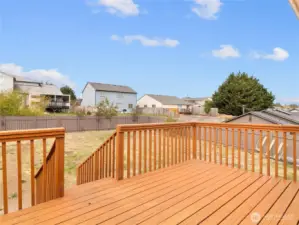 Recently repainted back deck! Excellent space to relax, hang out or even entertain