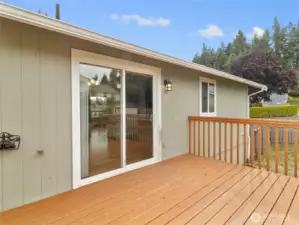 Plenty of deck space right outside the dining area/kitchen