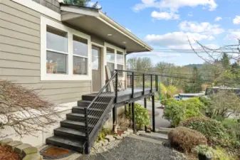 Front Door Entry. There is also a muddroom entrance and basement door entry.