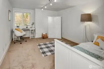 Spacious guest room 2 with walk-in closet.