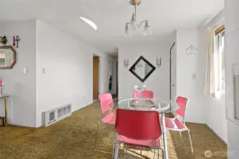 Dining room looking down hallway to bedrooms.