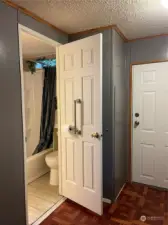 From utility and exit door is the Guest bath