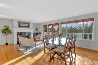 Formal living room & dining room --surrounded by windows for natural light --with western views.