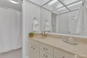 The upper level full bathroom is just around the corner from the bedrooms.
