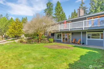 Front yard with view towards the front of the home--surrounded by established garden and plantings for ultimate privacy.