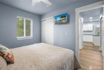 Ceiling fans with remotes in every bedroom.