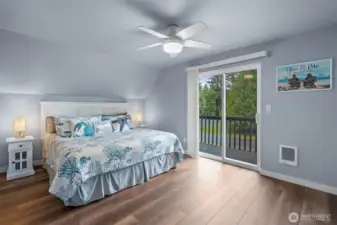 Slider in Primary bedroom opens to private balcony. Wall heat.