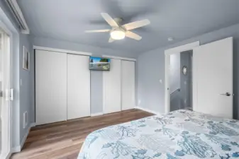 Another view of the Primary Bedroom showing the dual closets.
