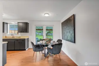 Dining Room w/ French Doors that lead to Outdoor Living Space.