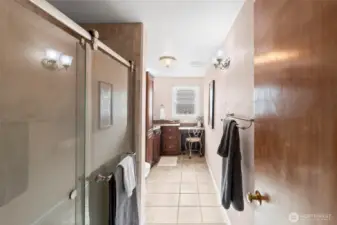 Updated ¾ bath with stylish vanity.
