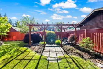 Beautiful arbor adds garden charm.