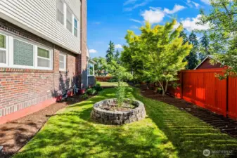 Beautifully landscaped, complete with fruit trees.