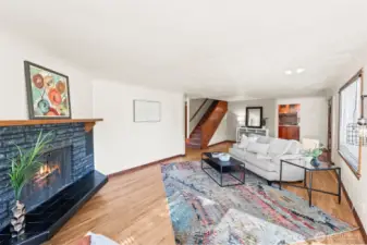 Hardwood floors, rich wood millwork, and coved ceilings.