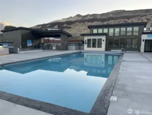 Clubhouse with pool and outdoor BBQ area