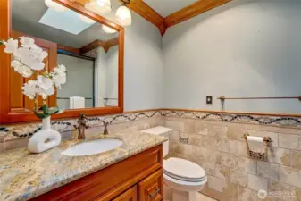 A full bath completes the upper level, ensuring comfort and convenience for the whole household.