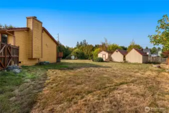 The property truly shines with its four custom-built sheds, including two oversized, providing unparalleled storage or workspace options.