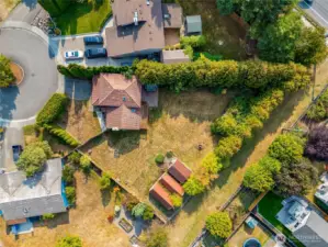 The combination of outbuildings and garage space makes this property highly adaptable for a variety of needs.