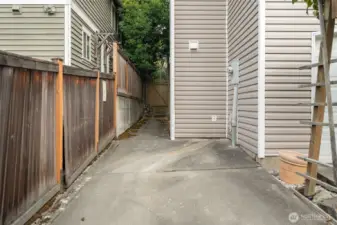 Dedicated parking spot off alley.