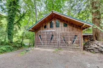 This is the huge workshop and 2 car garage - a woodworker's or artist's dream!!! Plus - to the right of this building is plenty of area for your extra recreational vehicle storage!!