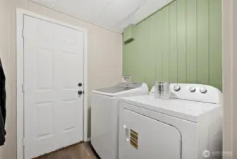 Utility room leads out to back deck/yard