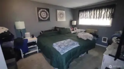 Master Bedroom with an oversized king size bed tons of room