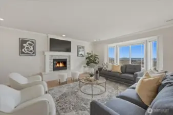 Natural light pours into the open, airy layout designed to capture the views like living artwork.