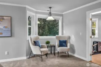 Cozy sitting area in the primary bedroom