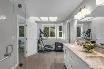 Exercise area in the primary bath; the space can be converted back to a tub