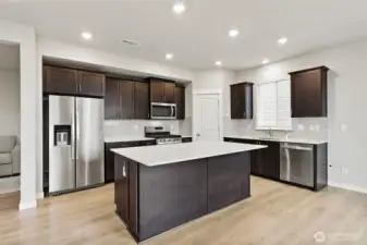 Centralized kitchen with lots of countertops