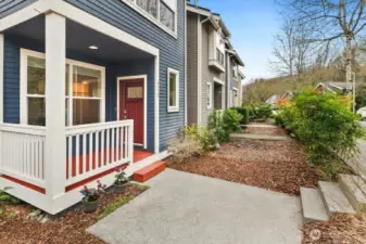 Love this transition to your private red-door entrance, perfectly situated for those who value a walkable, urban lifestyle.