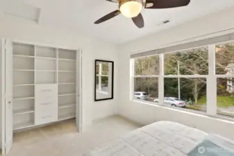 Every inch of the second spare room is maximized with high-end, custom closet shelving for ultimate functionality.