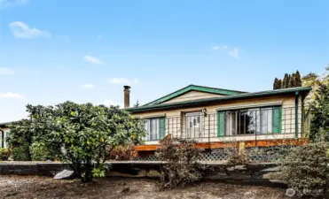 Front of home overlooking Reflection Lake to the southwest for great year round light.