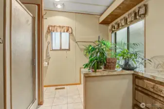 Master bedroom suite with a double walk in closet and 5 piece bathroom overlooks the lake.