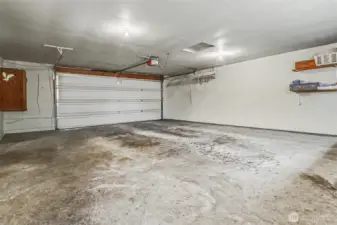 Oversized (672 sq ft per SCR) attached 2 car garage and workshop.