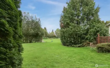 South side of the home boarders a community trail, greenbelt and creek for a very private natural setting.