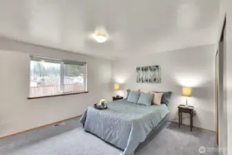 Master bedroom can easily fit a king bed.  (Queen shown here)