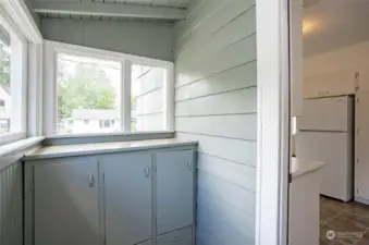 Mudroom off the kitchen leads to garage