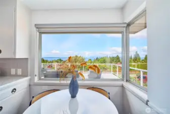 Breakfast nook with views and overlooking the deck.