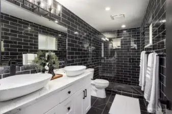 All 3 bathrooms have gorgeous custom tile work.