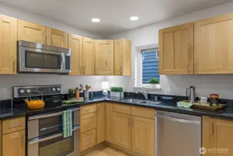 Stainless appliances nod to the luxury of this incredible updated dream kitchen