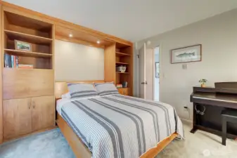 Space-saving Murphy Bed in second bedroom. Pull down when you have guests and use as office, workout space or hobby room when you don't have guests.