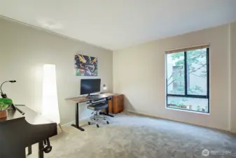 With the Murphy bed tucked away there is lots of space for a home office or hobby space.